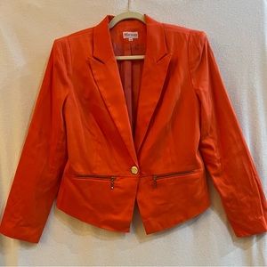 European size 44, tangerine color, cropped blazer w/single button and zippers.